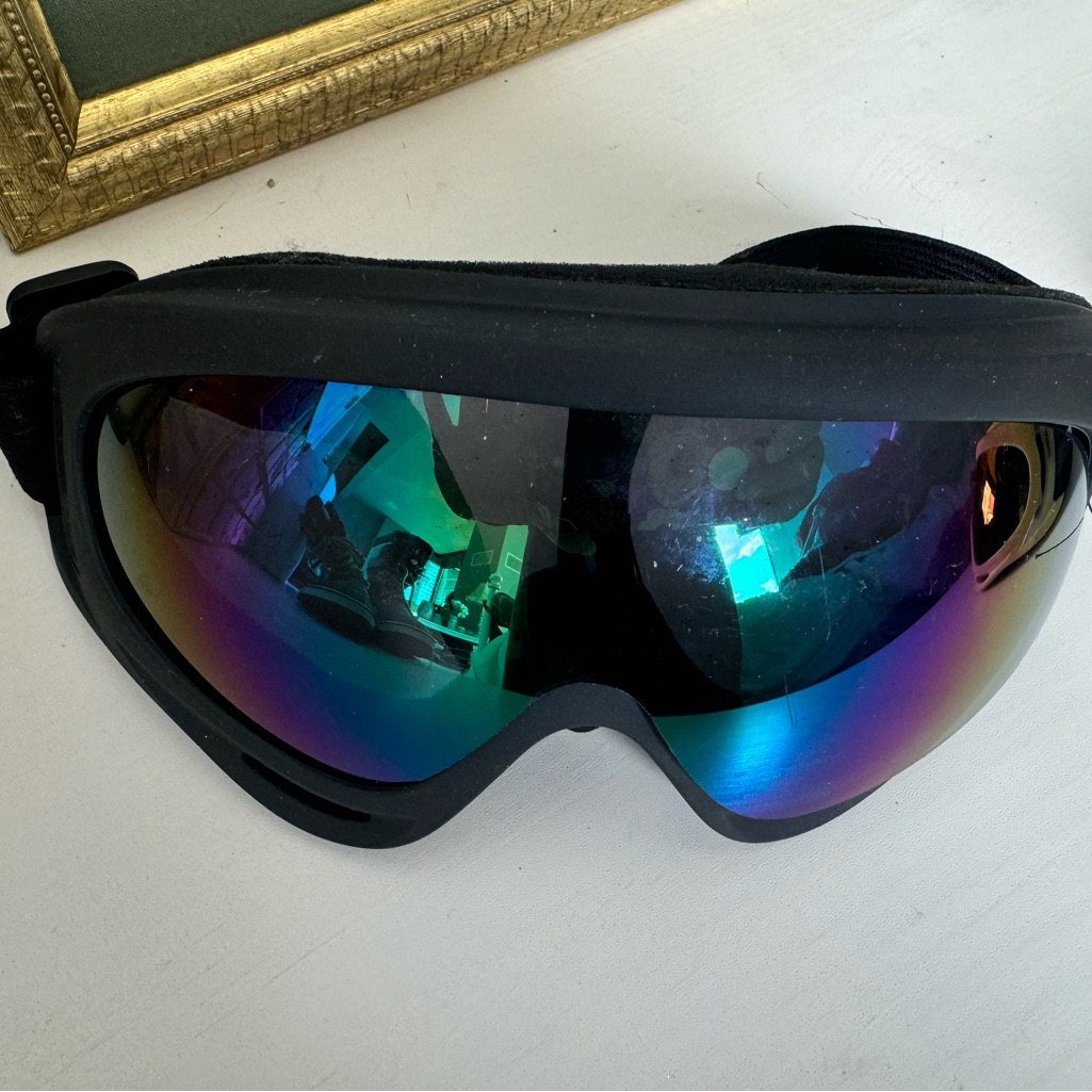 Black Vr Headset With Blue Lens